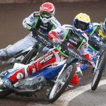 Denmark's Nicki Pedersen competes with Sweden's Peter Ljung and Russia's Gregory Laguta during the 2012 FIM Monster Energy Speedway World Cup Final in Malilla