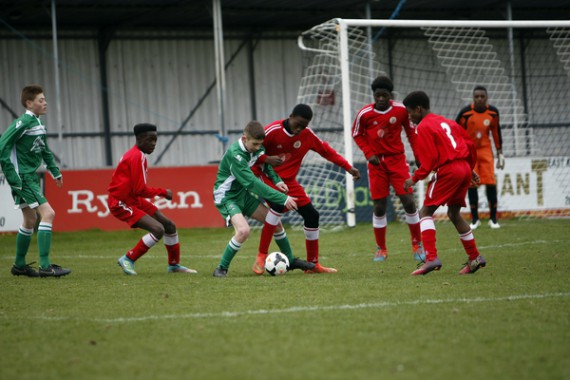 Kent FA Under 14 Youth Cup Final. Meridian VP v Thamesmead. Meridian VP in red.