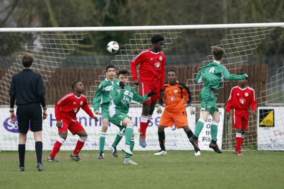 Kent FA Under 14 Youth Cup Final. Meridian VP v Thamesmead. Meridian VP in red.